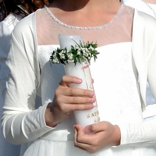           Mädchen mit Kerze